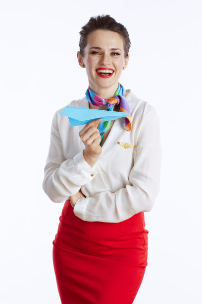 微笑优雅的空姐穿着白色衣服图片下载