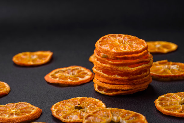 干圆形鲜橙色橘片图片下载