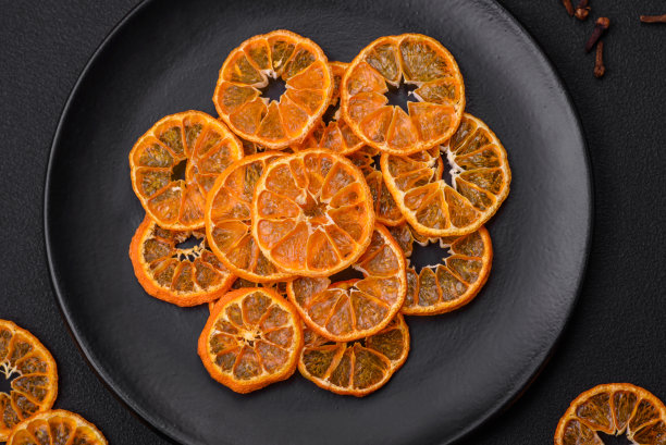 干圆形鲜橙色橘片图片下载