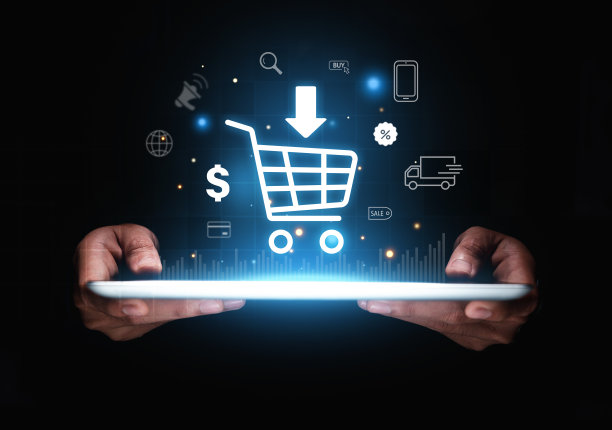 商人的手显示在平板电脑上的购物车图标。图片下载