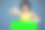 年轻女子指着蓝色背景下空白的绿色广告牌图片下载