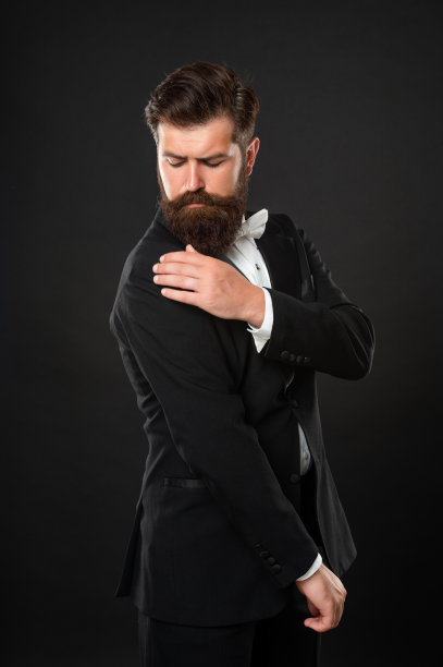 优雅的管家有头皮屑对燕尾服黑色背景，优雅图片下载