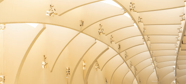 当代建筑抽象背景-弯曲和圆顶的米黄色形状纹理。图片下载