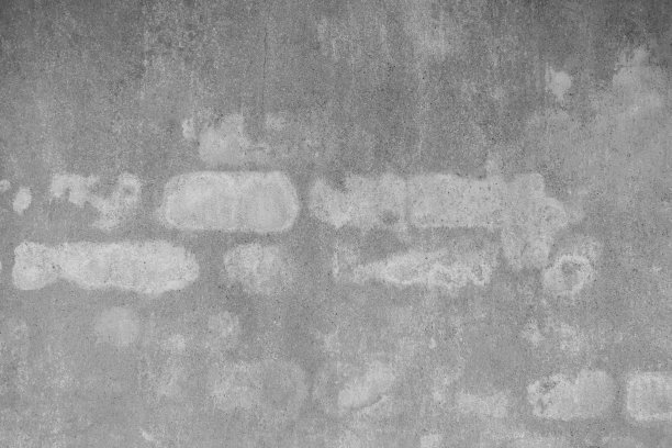 概念的一个简单的白色抹灰砖墙与裂缝的背景，图案和纹理的背景。混凝土表面略粗糙。随机无缝墙面图案。图片下载