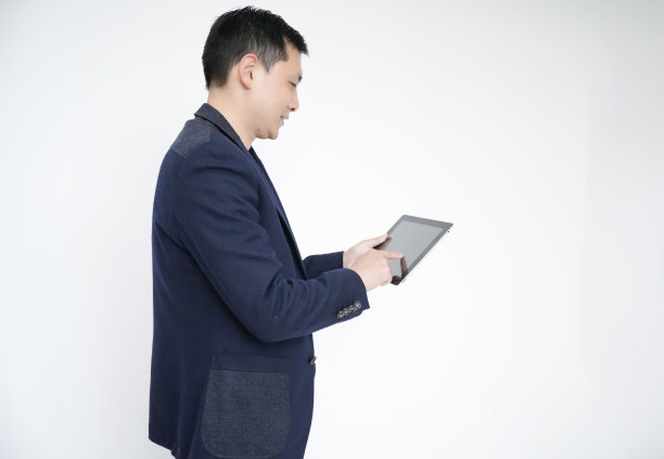 企业家、商人、白领经理使用平板电脑的肖像图片下载
