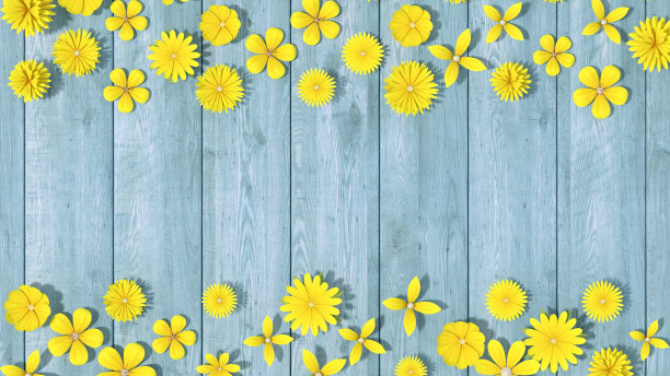 春天的花朵在木头背景上图片下载