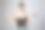 美丽的金发女人与刘海微笑，双臂伸展，在她的手掌里拿着什么。图片下载