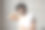 男性美容护理。快乐的印度男人肩上扛着毛巾站在浴室里，对着镜头微笑图片下载