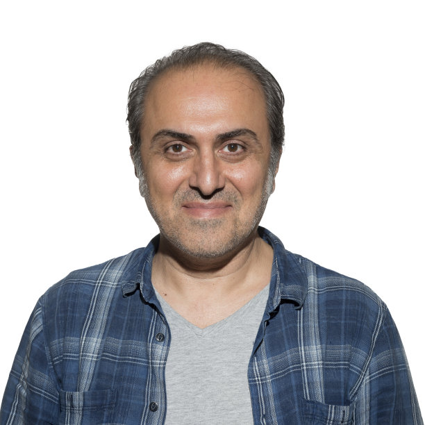 一个穿着蓝色衬衫的男人的肖像图片下载