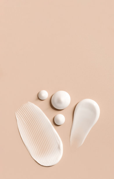 化妆品涂抹奶油纹理米色背景图片下载