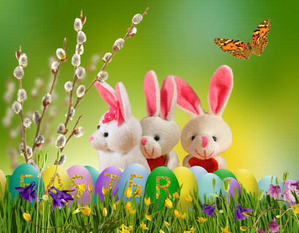 复活节贺卡上有复活节彩蛋，一只兔子以美丽的花朵为背景图片下载