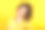 工作室拍摄的积极和微笑的女孩摇着头。穿着亮黄色t恤的年轻卷发女人。黄色背景。图片下载
