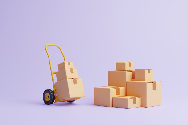 棕色纸板箱与手推车在淡紫色的背景图片下载