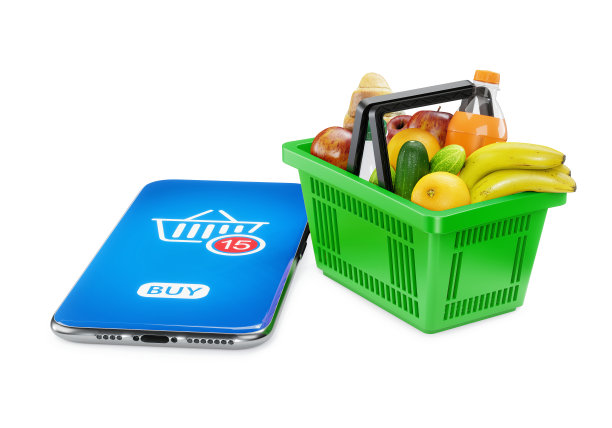 在线购买和配送。绿色购物篮，有新鲜食物和智能手机图片下载