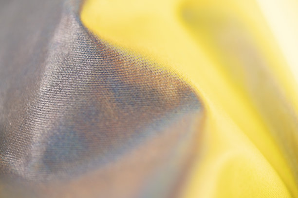 黄色和银色的抽象纺织品。图片下载