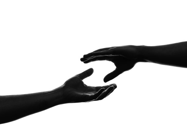 手相互伸出的剪影图片下载