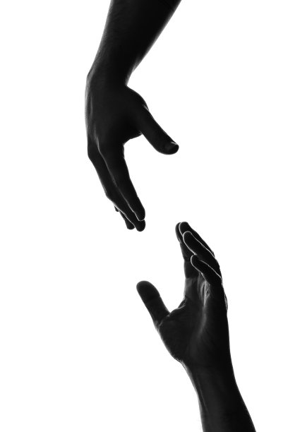 手相互伸出的剪影图片下载