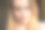 水平镜头滑稽幽默俏皮年轻的欧洲女子做鬼脸，试图触摸鼻子与她的嘴唇。人、青春、休闲、欢乐、趣味、随性、娱乐的理念图片下载