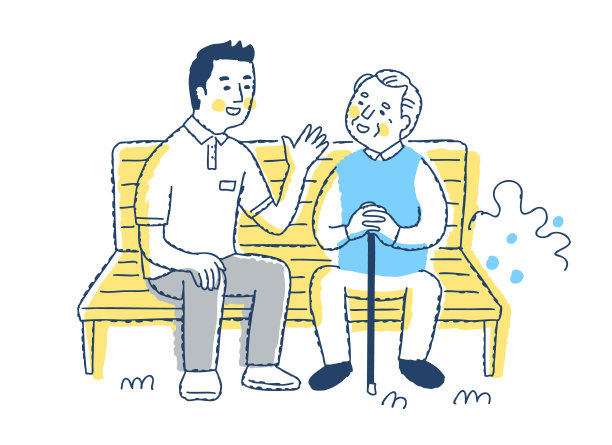 老人和护理人员坐在长凳上聊天图片下载