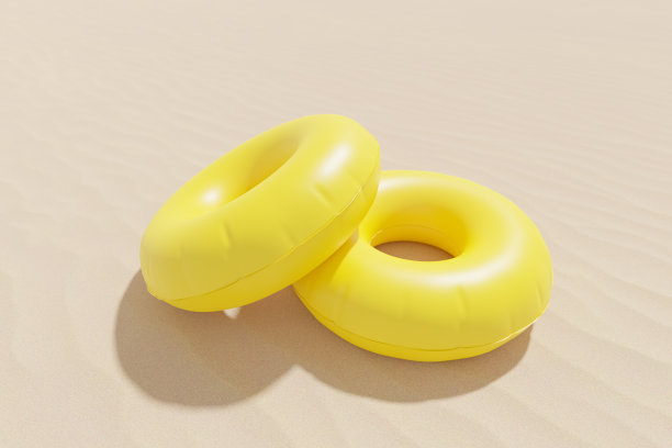 沙滩上的充气游泳圈，3d渲染。游泳管在明亮的颜色，概念的夏天，假期和海上度假图片下载