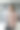 一位成功的亚洲女商人坐在办公室的桌子上，手里拿着平板电脑和咖啡杯。图片下载