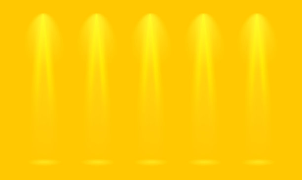 明亮的黄色场景与五个柔和的聚光灯。图片下载