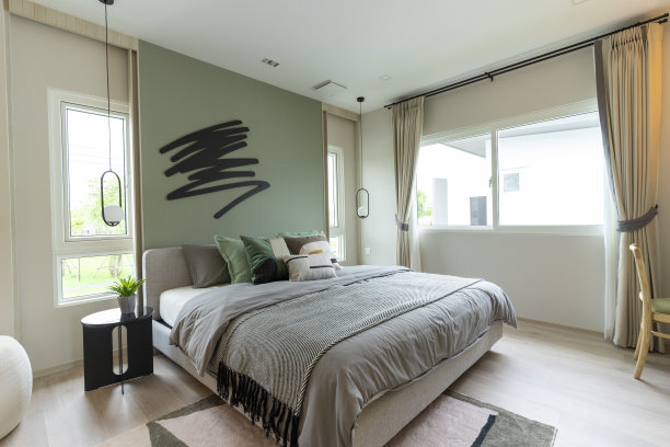 现代卧室室内绿色墙壁和墙壁艺术。图片下载