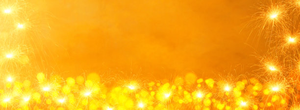 金色的火花和模糊的灯光图片下载