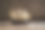 一个布满灰尘的旧船模放在一个粗糙的木架子上。图片下载