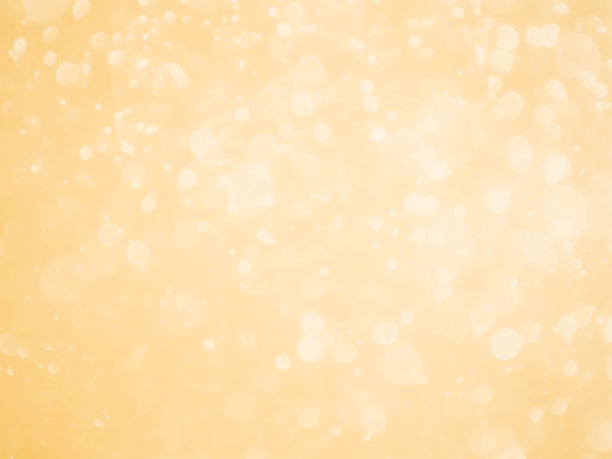 金色背景与柔和的散景灯。图片下载