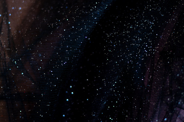 暗色织物与闪光作为背景特写图片下载