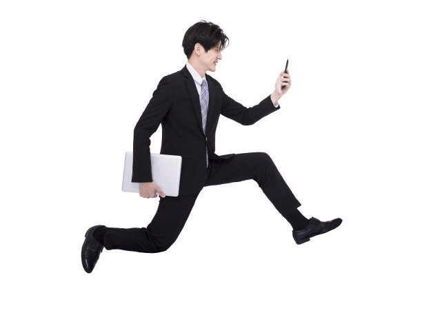 侧视图的商人运行和使用手机图片下载