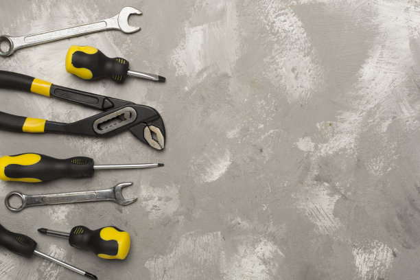 一组工具在混凝土背景，俯视图图片下载