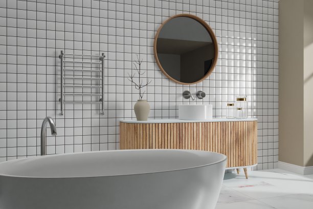 浴室内部白色，设有洗脸盆柜，洗脸盆、水龙头离墙和圆形镜子图片下载