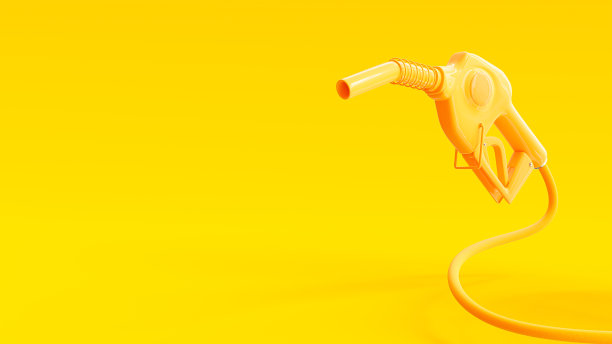 汽油黄色喷油器燃油泵喷嘴黄色背景。可以使用文字输入或横幅相关的石油行业和加油服务。设计在最小的概念。图片下载