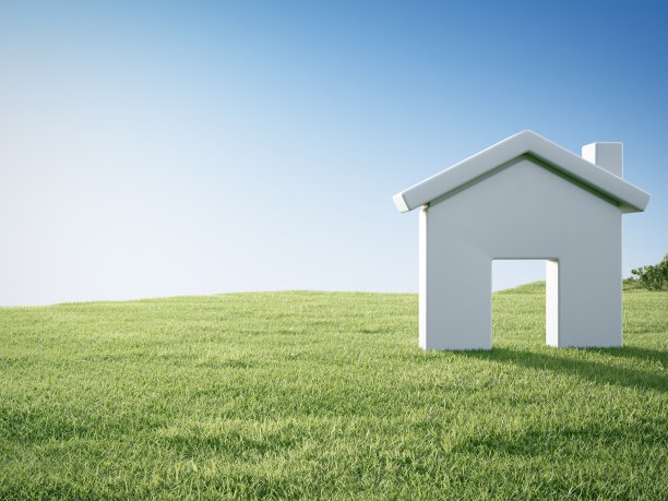 房子标志与空草地板。图片下载