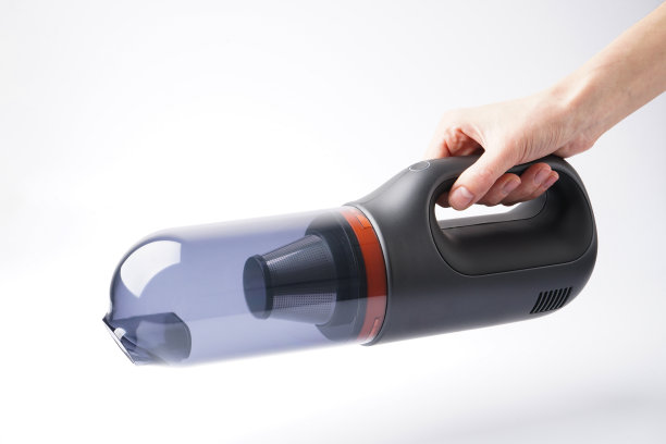 白色背景手持式吸尘器。图片下载