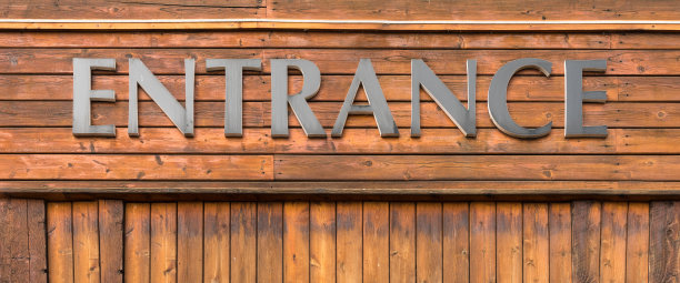 古老的复古木纹墙和入口标志的商店背景图片下载