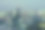 模糊的暮色中，城市办公楼的灯光，抽象的背景图片下载