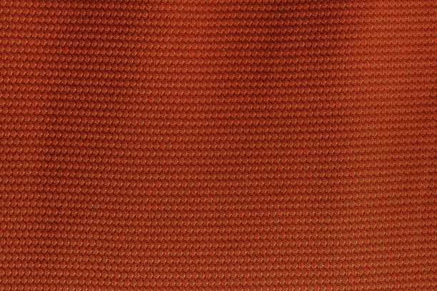 红色运动服装面料，足球衬衫，运动衫的纹理和纺织背景。图片下载