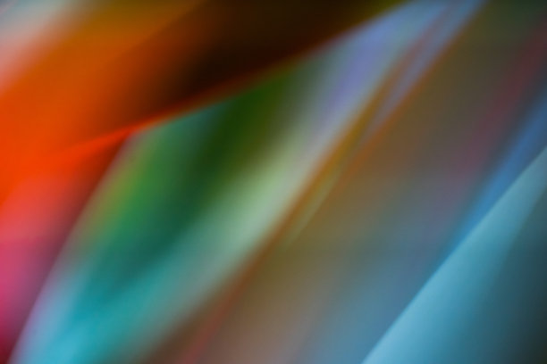 微距摄影霓虹灯色的郁金香花瓣和叶子。色彩丰富，自然抽象的背景。图片下载