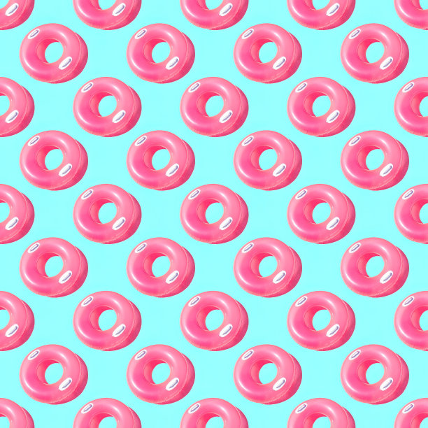 浅蓝色背景上亮粉色充气橡胶圈图案图片下载