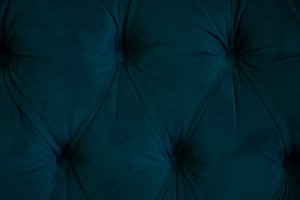 背景的软织物墙缝纽扣，床侧作为背景图片下载