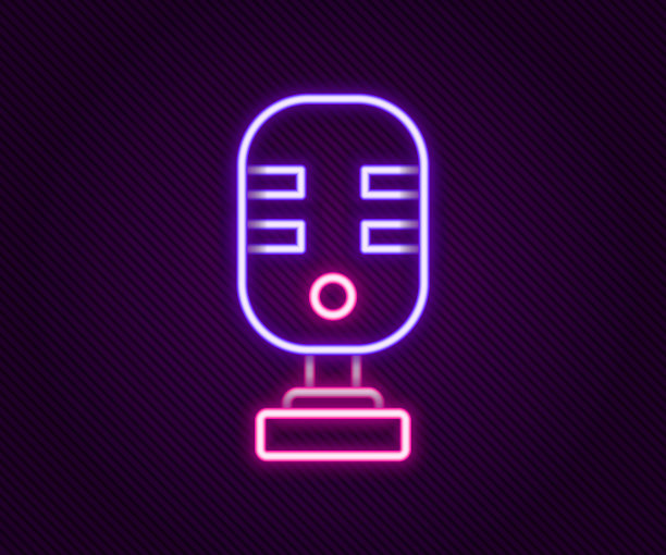 发光的霓虹灯线麦克风图标隔离在黑色背景上。在空中无线电麦克风。演讲者的迹象。彩色轮廓概念。向量图片下载