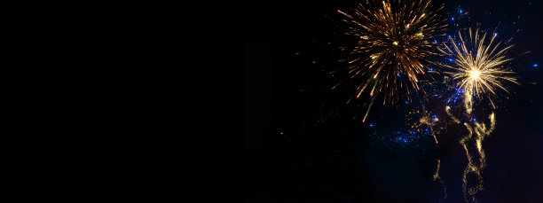 西尔维斯特，新年，2024年除夕的背景横幅-金色的烟花烟花烟火在漆黑的夜空图片下载