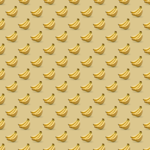 无缝模式与新鲜香蕉在黄色背景。打印的概念。图片下载