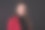一个女商人的肖像在一个黑色背景的红色西装。图片下载