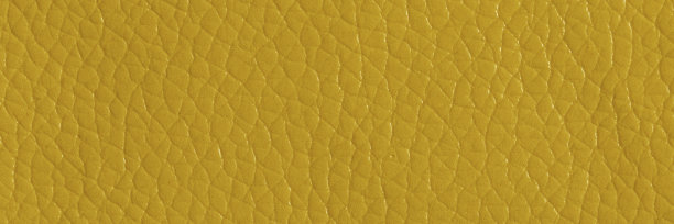 黄色皮革和纹理背景，宽横幅。图片下载