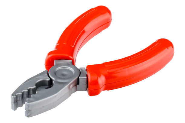 白色背景上的一套玩具工具。儿童工作工具，钳子。建造者游戏的塑料工具。儿童角色扮演游戏图片下载