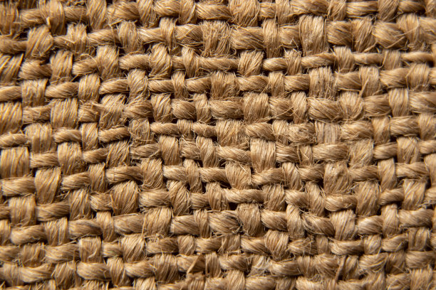 棕色粗麻布为背景特写图片下载